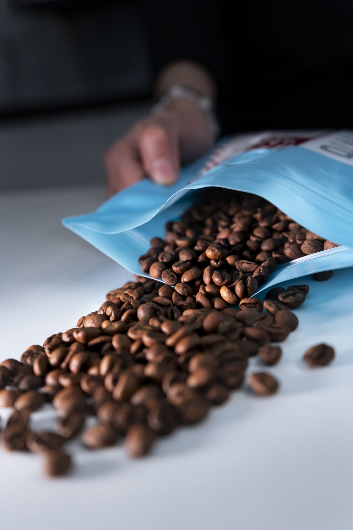 Open bag of Quinto Café with specialty coffee beans